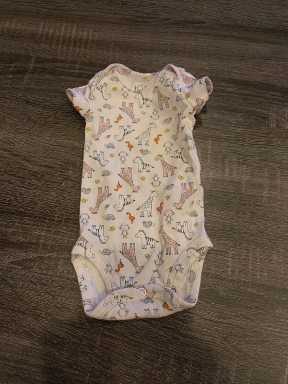 Carter's Cream One-Piece Bodysuit with Pastel Animal Print